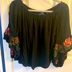 Off the shoulder, lined black with flower bell sleeves